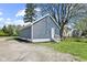 Well-maintained home boasts updated siding, a pristine lawn, and mature trees in a residential area at 507 Dr Martin Luther King Jr Blvd, Anderson, IN 46016