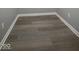 Grey wood-look flooring with white trim at 507 Dr Martin Luther King Jr Blvd, Anderson, IN 46016