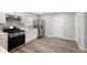 This remodeled kitchen has stainless steel appliances, modern countertops, and bright white cabinets at 507 Dr Martin Luther King Jr Blvd, Anderson, IN 46016