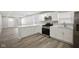Updated kitchen with bright cabinets, stainless steel appliances and bar seating at 507 Dr Martin Luther King Jr Blvd, Anderson, IN 46016