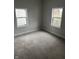 Bedroom features new carpet, fresh paint and two windows at 517 W 26Th St, Indianapolis, IN 46208