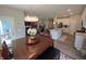 This dining room connects the kitchen and living room in an open concept layout at 5269 Parkhurst Xing, McCordsville, IN 46055
