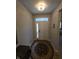 Inviting foyer featuring a stylish chandelier and wood flooring at 5269 Parkhurst Xing, McCordsville, IN 46055