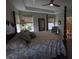 Main bedroom boasts a large bed, ceiling fan, and windows with natural light at 5269 Parkhurst Xing, McCordsville, IN 46055