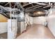 Unfinished basement with water heater and utilities, offering opportunity for customization and added functionality at 548 E 39Th St, Indianapolis, IN 46205