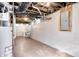 Spacious unfinished basement area with utilities and exposed ceiling, presenting a blank canvas for future development at 548 E 39Th St, Indianapolis, IN 46205