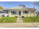 Charming home featuring front yard, traditional facade, with steps leading up to the front door at 548 E 39Th St, Indianapolis, IN 46205