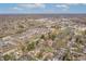Expansive aerial view of neighborhood with tree-lined streets near community sports field at 5954 Crestview Ave, Indianapolis, IN 46220