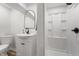 Modern bathroom featuring a sleek vanity, black fixtures, and walk-in shower at 5954 Crestview Ave, Indianapolis, IN 46220