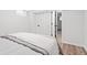 Bedroom with a full sized bed, and an open closet door revealing the bathroom at 5954 Crestview Ave, Indianapolis, IN 46220