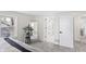 Bright bedroom with a plant, neutral carpet, and an open doorway to the ensuite at 5954 Crestview Ave, Indianapolis, IN 46220