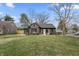 Charming renovated home featuring new black paint, shutters, landscaping, and ample lawn space at 5954 Crestview Ave, Indianapolis, IN 46220