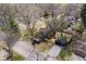 View of modern house with private backyard, wooden fence, patio, and detached garage at 5954 Crestview Ave, Indianapolis, IN 46220