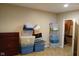 Unfinished basement with storage bins and access to utility closet at 5983 Clearview Dr, Carmel, IN 46033
