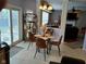 Breakfast nook with sliding glass door and round dining table at 5983 Clearview Dr, Carmel, IN 46033