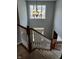 A grand chandelier hangs above the foyer, creating an elegant entryway to this charming home at 5983 Clearview Dr, Carmel, IN 46033
