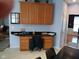 Spacious kitchen with built-in desk area, ample counter space, and natural light at 5983 Clearview Dr, Carmel, IN 46033
