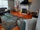 Cozy living room with fireplace, hardwood floors, and comfortable seating at 5983 Clearview Dr, Carmel, IN 46033