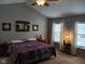 Spacious main bedroom features vaulted ceilings, large windows, and lots of natural light at 5983 Clearview Dr, Carmel, IN 46033