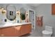 Bathroom featuring toilet and decorative wall art, gold fixtures and decor at 6185 Evanston Ave, Indianapolis, IN 46220