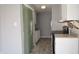 Kitchen showcasing white cabinetry, black appliances, and light gray walls at 6512 Lupine Ter # 6512, Indianapolis, IN 46224