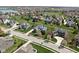 Picturesque aerial view of a residential neighborhood with tree-lined streets and community amenities at 6645 Braemar N Ave, Noblesville, IN 46062