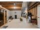 Large, unfinished basement area featuring a sauna, basketball hoop, and assorted workout equipment at 6645 Braemar N Ave, Noblesville, IN 46062