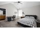 Well-lit bedroom with vaulted ceiling, ceiling fan, and a dedicated desk space at 6645 Braemar N Ave, Noblesville, IN 46062