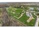 Aerial shot of a community park with walking paths, a gazebo, and green open space at 6645 Braemar N Ave, Noblesville, IN 46062
