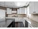 Well-designed kitchen featuring granite countertops, stainless steel appliances, and ample storage at 6645 Braemar N Ave, Noblesville, IN 46062