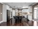 Elegant kitchen with white cabinetry, stainless steel appliances, and a spacious center island at 6645 Braemar N Ave, Noblesville, IN 46062