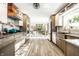 Spacious kitchen featuring stainless steel appliances and ample counter space at 6911 N Tuxedo St, Indianapolis, IN 46220