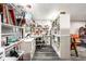 Bright basement office with built-in shelving and desk space, offering ample storage and natural light at 6911 N Tuxedo St, Indianapolis, IN 46220