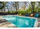 Inviting in-ground pool with a clean, modern design and ample space for lounging in the sun at 6911 N Tuxedo St, Indianapolis, IN 46220