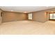 Large basement area featuring a window for natural light at 7128 Trail Ridge Ln, Indianapolis, IN 46259