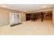 Finished basement showcasing a pool table, an outside entrance, and a bar area at 7128 Trail Ridge Ln, Indianapolis, IN 46259