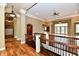 Spacious foyer with hardwood floors and an elegant staircase, creating a grand entrance at 7128 Trail Ridge Ln, Indianapolis, IN 46259