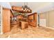 Open kitchen featuring custom cabinetry, an island, and stone tile flooring at 7128 Trail Ridge Ln, Indianapolis, IN 46259