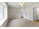 Spacious bedroom with carpet floor, natural light and access to en-suite bath at 7219 Snider Ct, Indianapolis, IN 46221