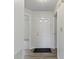 Clean foyer featuring a white door, wood-look floors and neutral wall paint at 7219 Snider Ct, Indianapolis, IN 46221