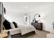 Modern bedroom featuring a comfortable bed, stylish dresser, and tasteful decor for a cozy retreat at 7230 Estes Dr, Indianapolis, IN 46239
