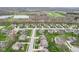 A peaceful community with manicured lawns and mature trees alongside lakes and green spaces at 7501 Independence Dr, Zionsville, IN 46077