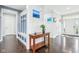 Bright foyer with hardwood flooring, built-in bench, and stylish decor that creates a welcoming entry at 7501 Independence Dr, Zionsville, IN 46077