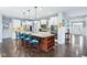 Spacious kitchen boasts a large island with seating, stainless steel appliances, and stylish cabinetry at 7501 Independence Dr, Zionsville, IN 46077