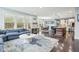 Open-concept living space combining living room, dining area, and kitchen, ideal for modern Gathering living and entertaining at 7501 Independence Dr, Zionsville, IN 46077