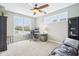 An office featuring a large window for ample light, desk, and view of the front yard at 7501 Independence Dr, Zionsville, IN 46077