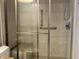 Updated bathroom with a tiled shower and glass door at 7675 Mistflower Ln, Noblesville, IN 46062