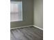 Neutral painted bedroom showcasing modern luxury vinyl plank flooring and natural light at 7675 Mistflower Ln, Noblesville, IN 46062