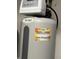 Novo water softener system with Summers Plumbing, Heating & Cooling sticker on the side at 7675 Mistflower Ln, Noblesville, IN 46062