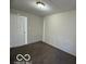 Bedroom with a carpeted floor and a light gray paint at 833 W Franklin St, Shelbyville, IN 46176
